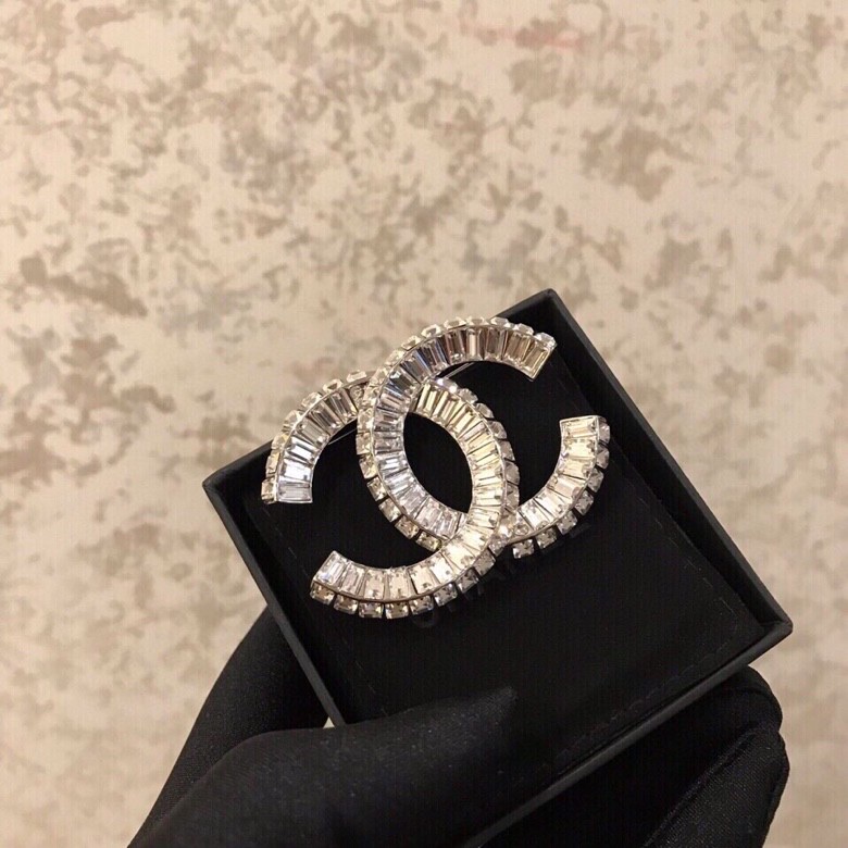 Ch*el brooches